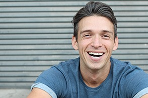 person smiling with Invisalign