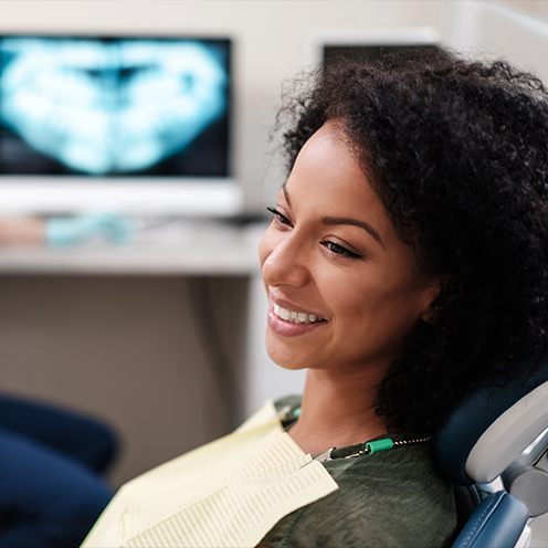 Woman smiling in dental chair