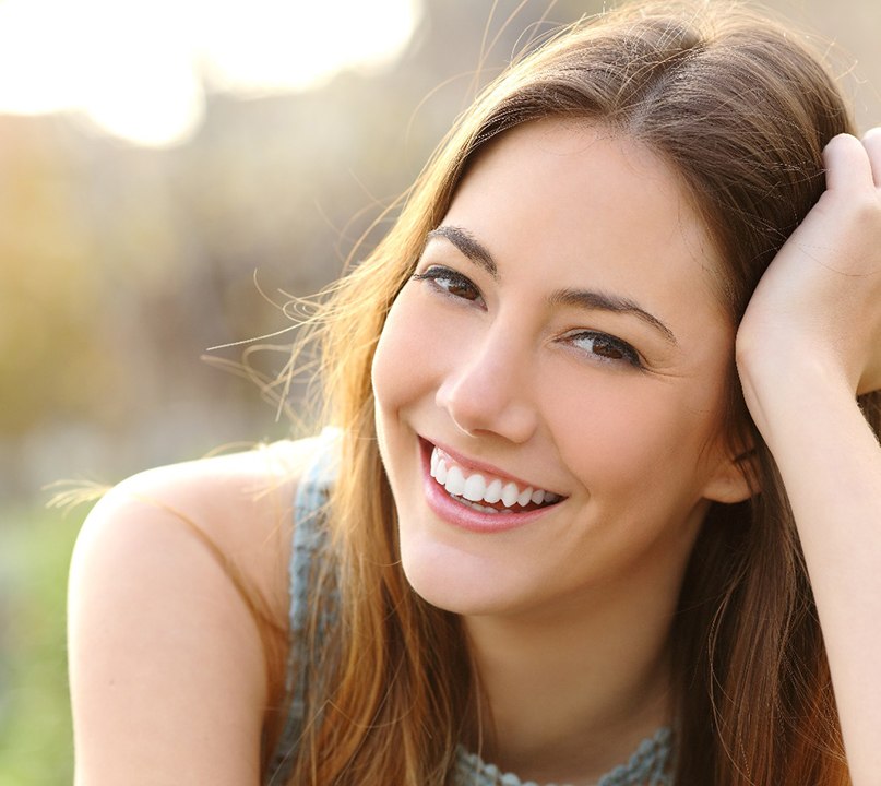 closeup of young woman smiling 