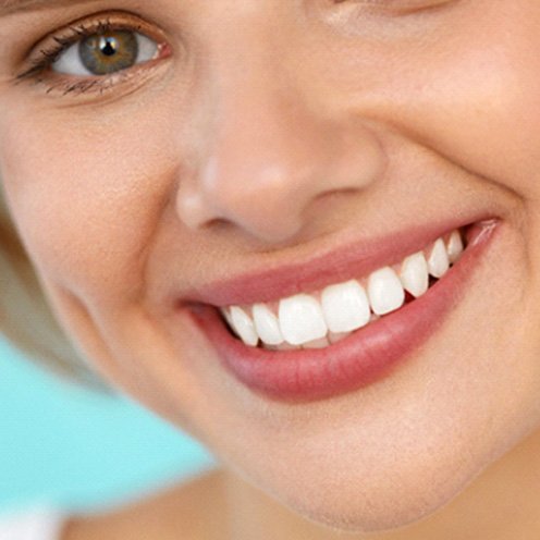 closeup of young woman smiling