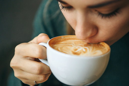 person drinking coffee 